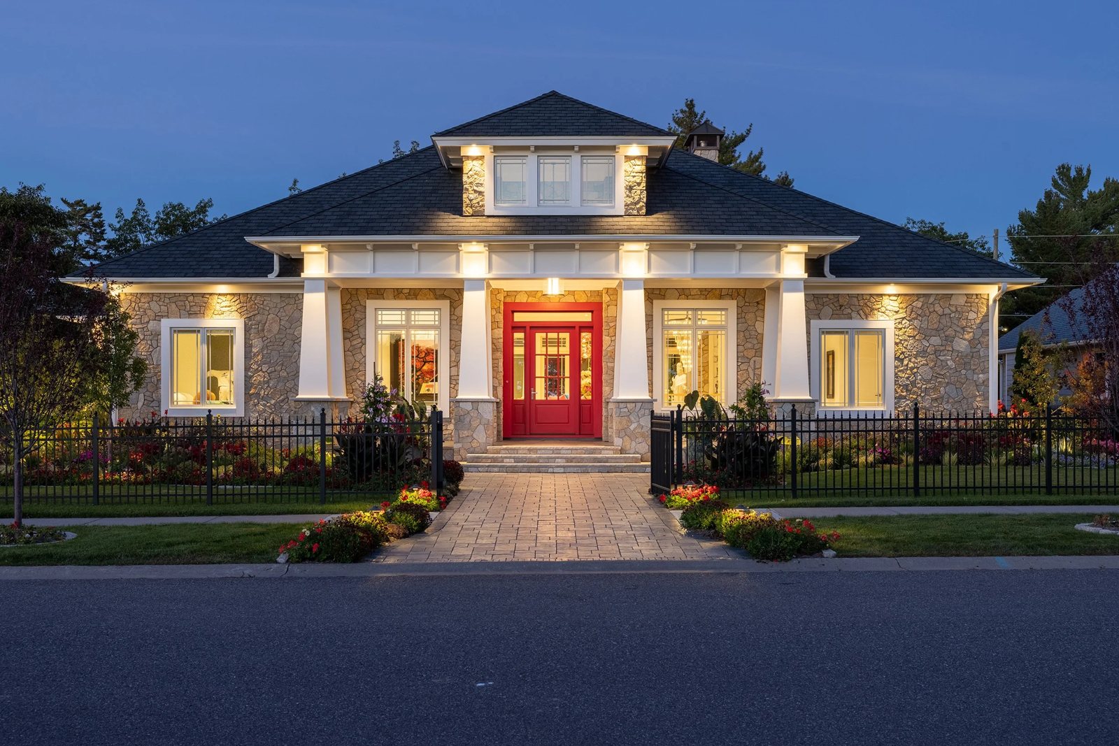Dickinson Homes custom home exterior at twilight